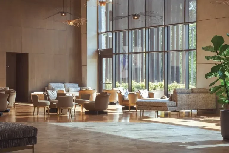 Living room with orange sofa and wooden partition